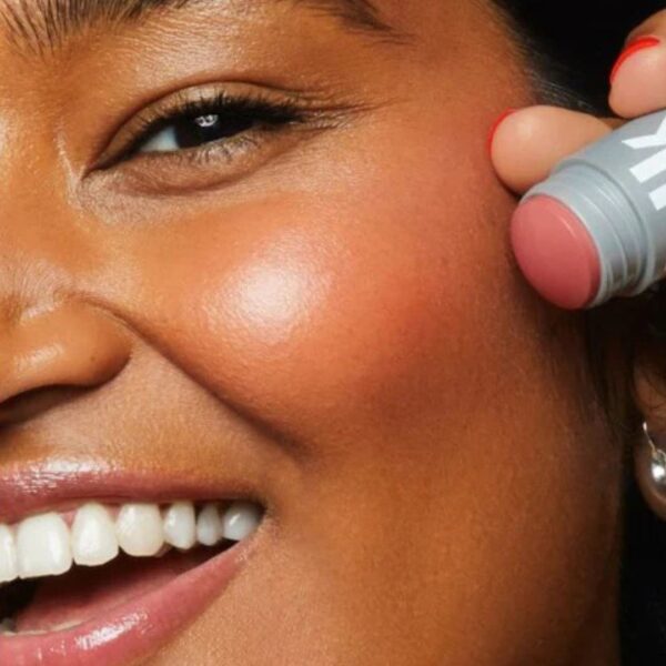 Swatch of Milk Makeup Lip + Cheek in 'Werk' on light skin, displaying its creamy, dusty rose hue with a natural, dewy finish.
