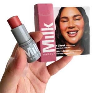 "Milk Makeup Lip & Cheek WERK swatched on skin – Blendable, natural flush."
