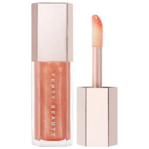 fenty beauty by rihanna gloss bomb universal lip luminizer in champ stamp fantasy, shimmering holographic gold pearl (mini size) 2 ml/ 0.07 oz
