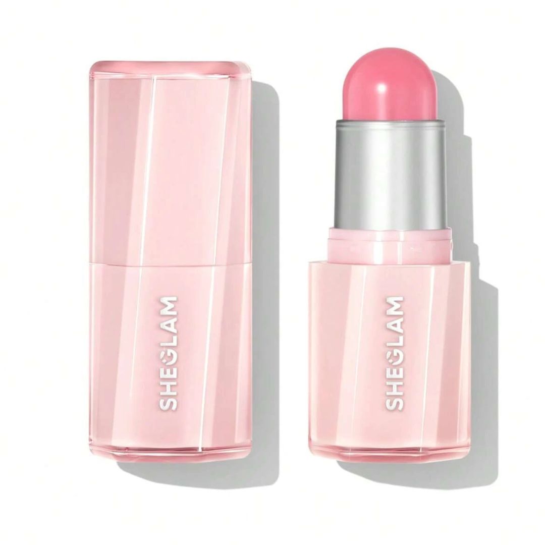 Model wearing Sheglam blush in shade Peach Flush