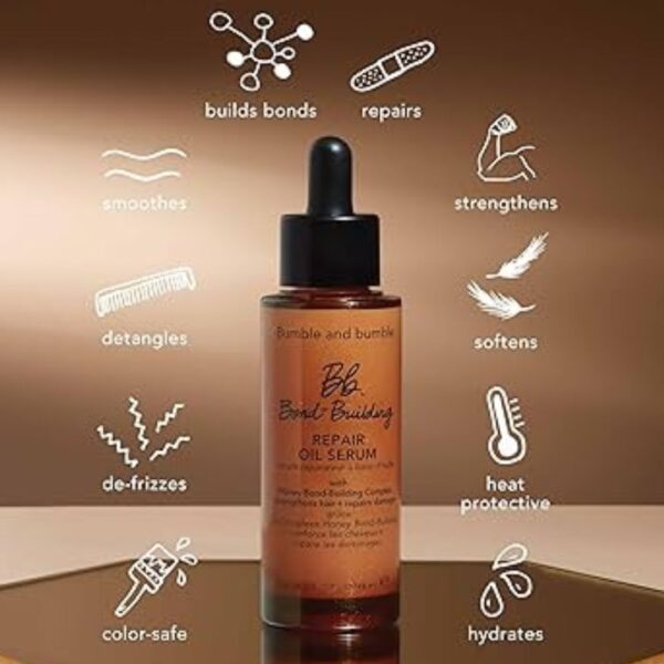 Model applying Bumble and bumble Bond-Building Hair Repair Oil Serum to damp hair, demonstrating its lightweight texture and ease of use."