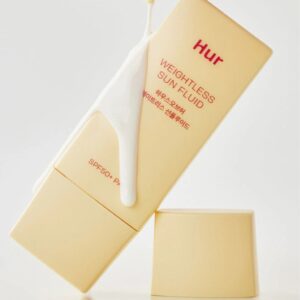 "House of Hur Weightless Sun Fluid SPF50+ in a sleek white and beige tube with minimalist branding."

