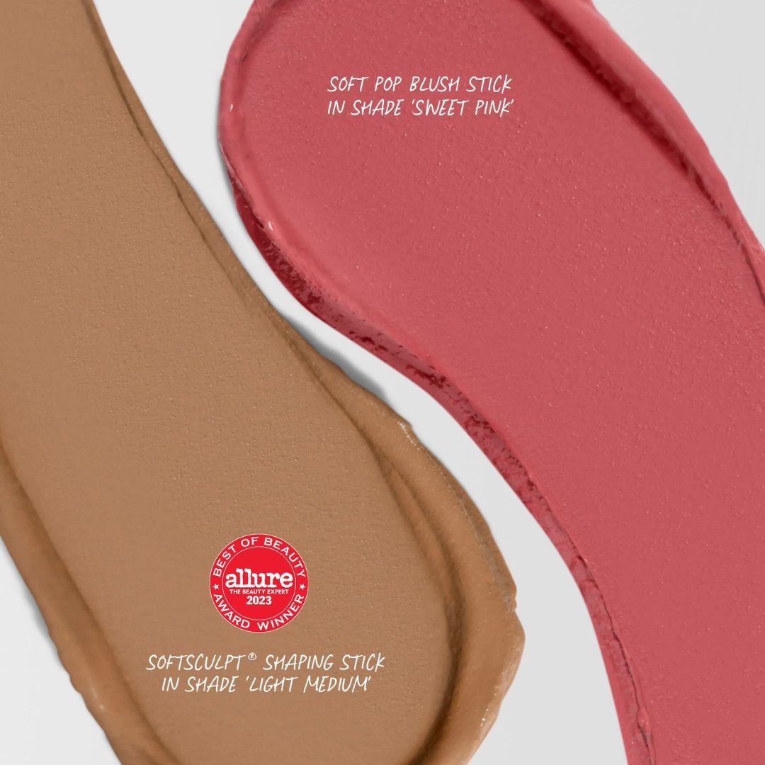 Woman blending Soft Pop blush stick on cheeks – natural makeup look