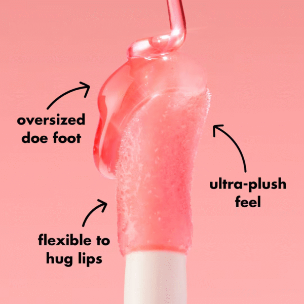Swatch of e.l.f. Glow Reviver Lip Oil on skin showing clear, glossy finish with subtle shine