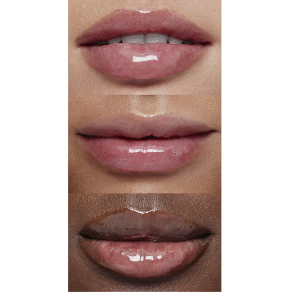 Model applying e.l.f. Glow Reviver Lip Oil to lips for a high-shine, hydrated look