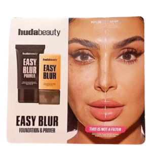 Sample card displaying Huda Beauty’s Easy Blur Primer in a soft pink tube and foundation sachet on a blush-toned background.